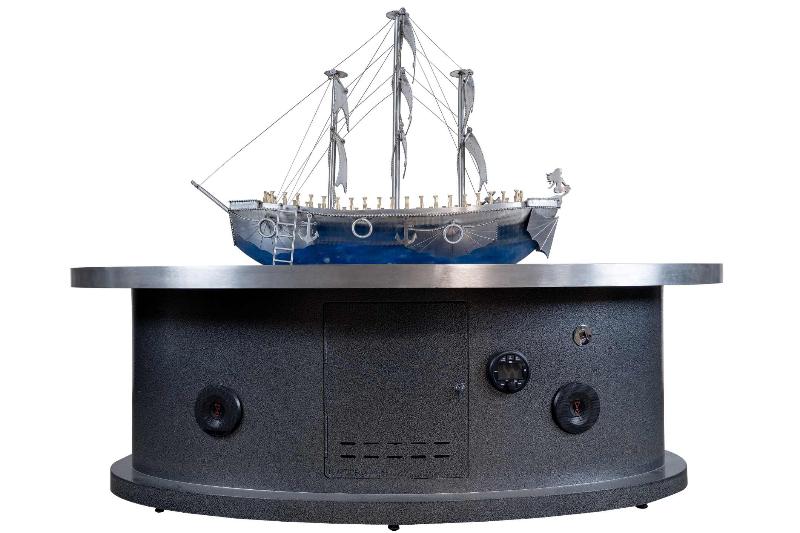 The back of the La Pinta fire table showing the controls and propane tank door.