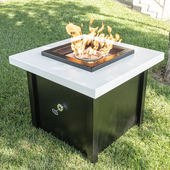 The Out Kamoa Fire Table on the lawn closeup