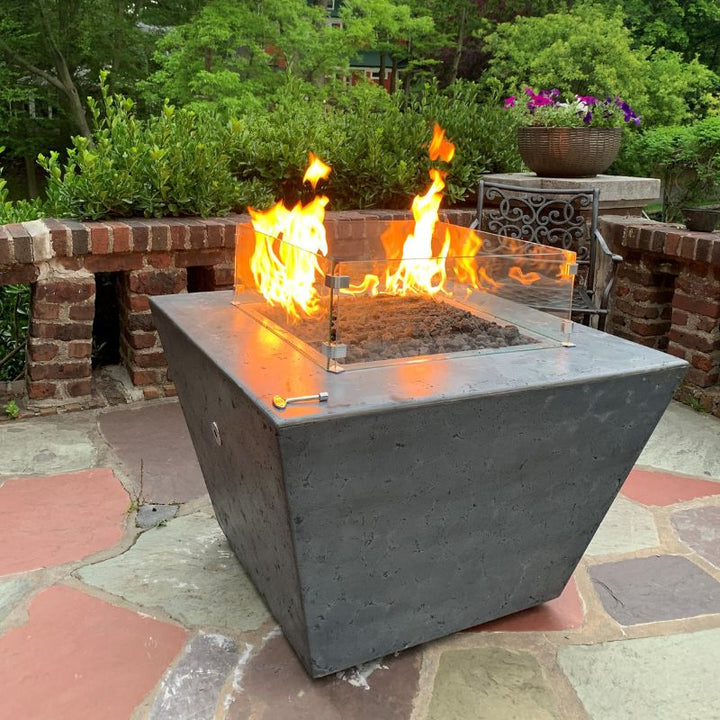 The Outdoor Plus Redan fire pit rustic gray on patio