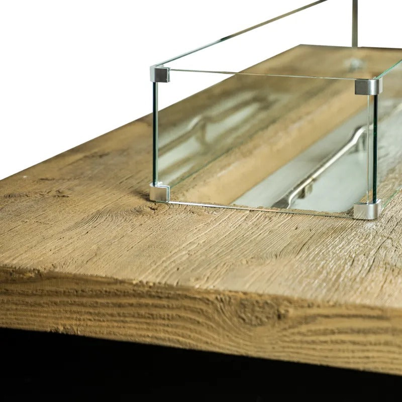 Close up Alameda fire table with a oak woodgrain top and a black powder coat base 