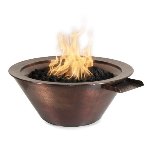 A Cazo fire and water bowl made with hammered copper.