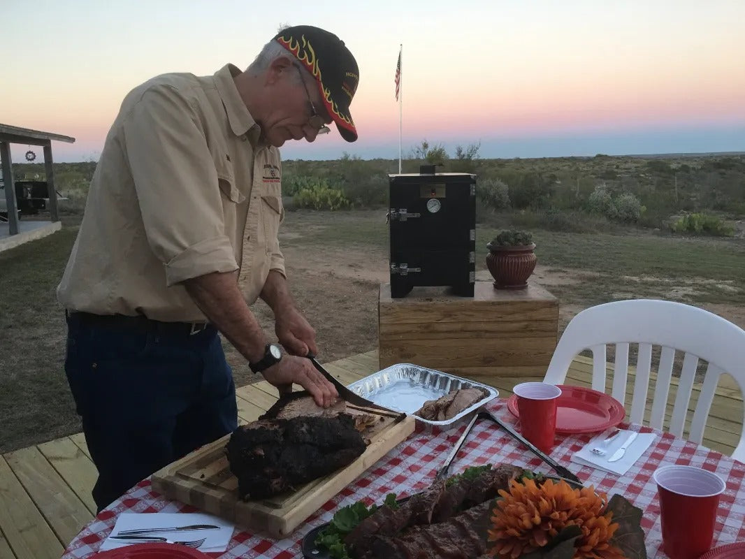 Cooking up a feast 
 with a Backwoods  smoker