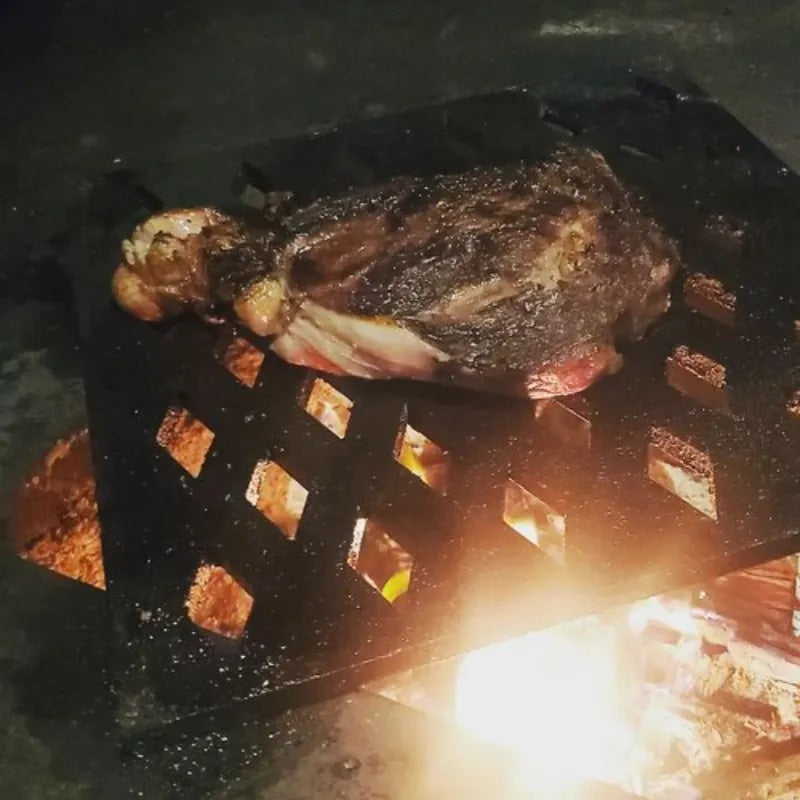 Hancock Sterling 40 wood grill grilling a juicy steak