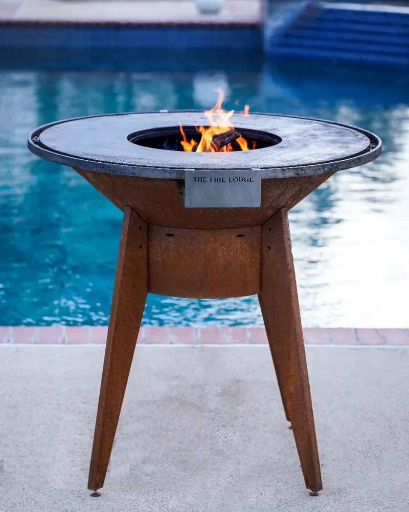 A Corten steel Mojave grill ready to grill poolside.