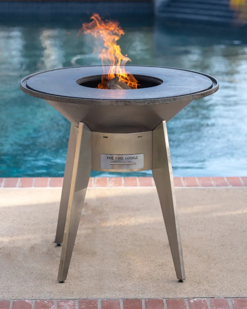 A Mojave grill flaming and ready to cook on poolside.