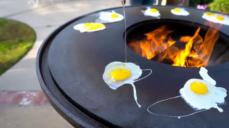 Cooking eggs for breakfast on a Mojave grill.