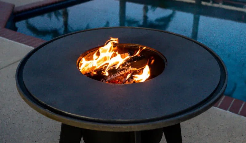 A good sized fire in a Mojave grill poolside.