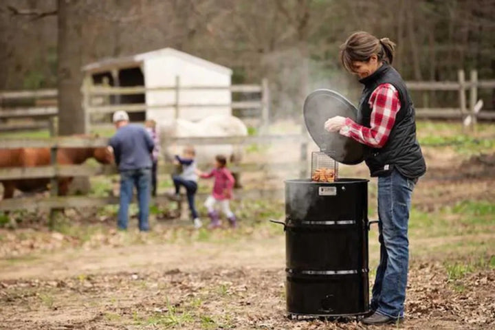 Pit Barrel Cooker All Purpose Basket cooking on the ranch
