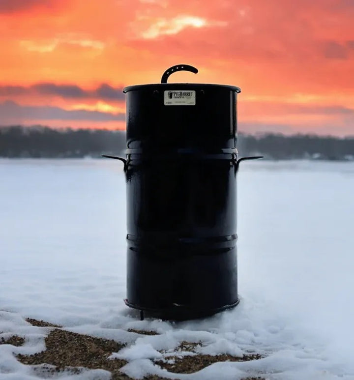 Pit Barrel Cooker Co Junior 14 inch cooking in the snow