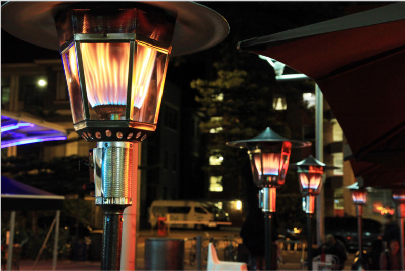 RADtec Real Flame patio heaters at night