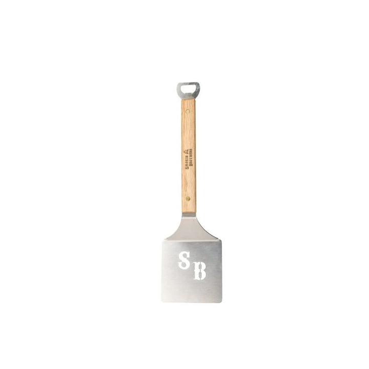 Smokin Brothers burger flipper SB logo on the flipper.