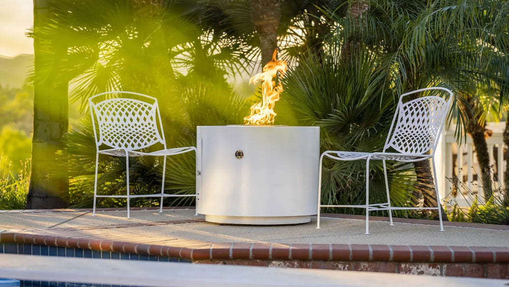 The Outdoor Plus Beverly fire pit powder coated white poolside