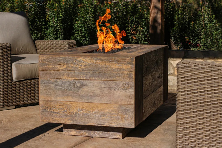 The Outdoor Plus Catalina fire pit oak wood grain on patio