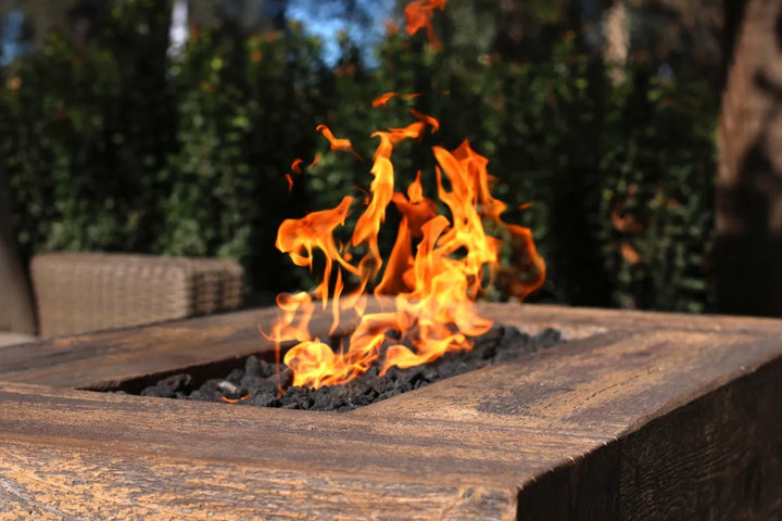 The Outdoor Plus Catalina fire pit oak wood grain with fire