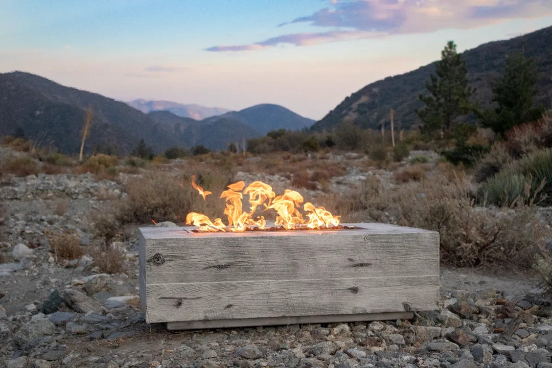 The Outdoor Plus Coronado fire pit ivory mountain scene