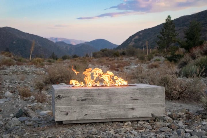 The Outdoor Plus Coronado fire pit ivory mountain scene