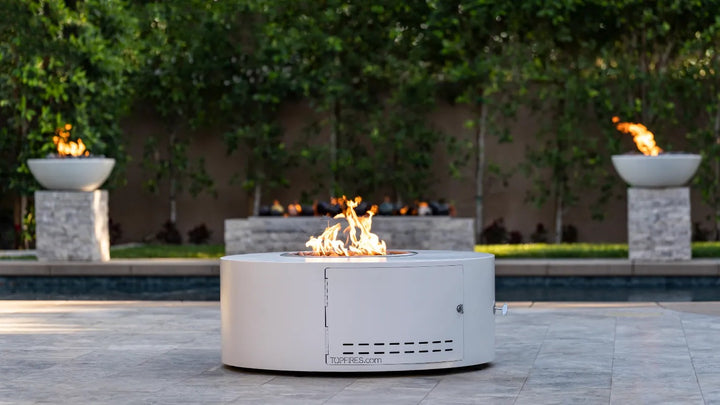 The Outdoor Plus Isla fire pit white powder coat with fire bowls