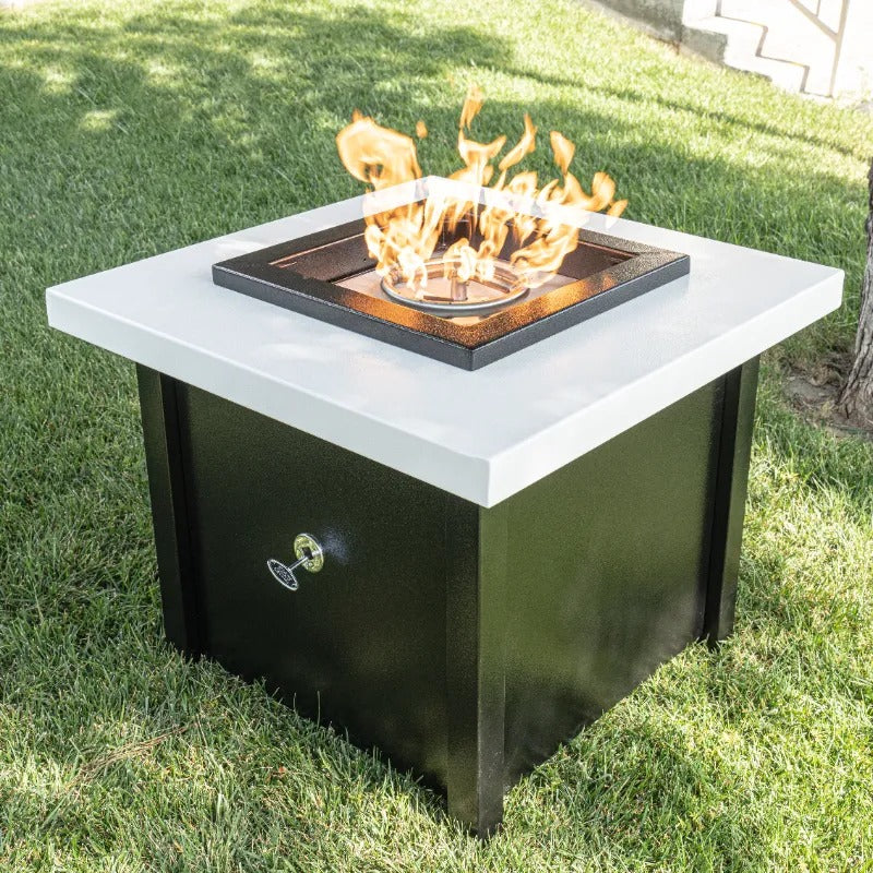 The Out Kamoa Fire Table on the lawn closeup