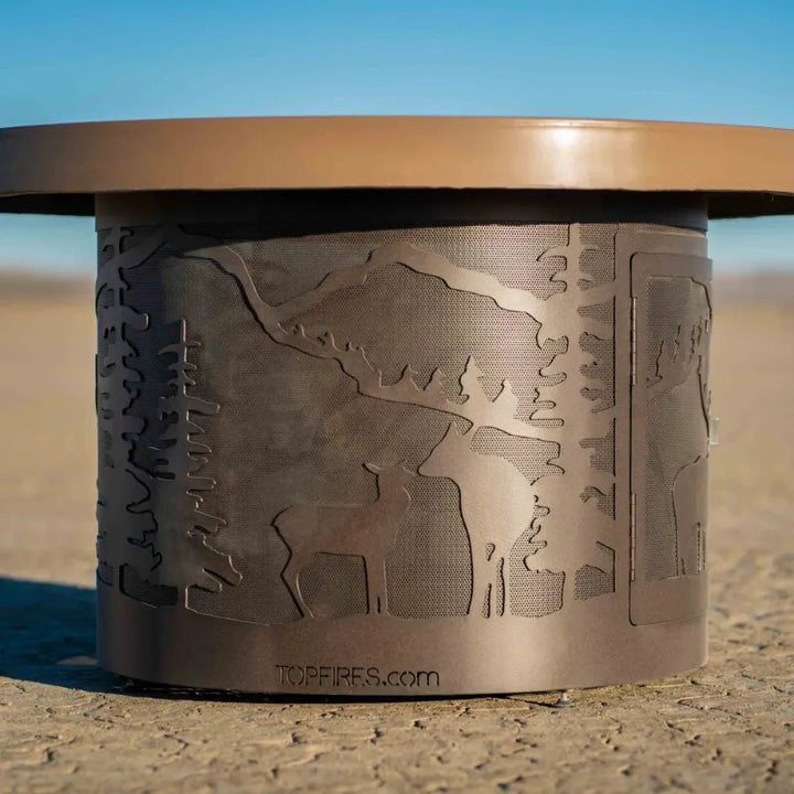 The Outdoor Plus Outback round fire table deer in the desert