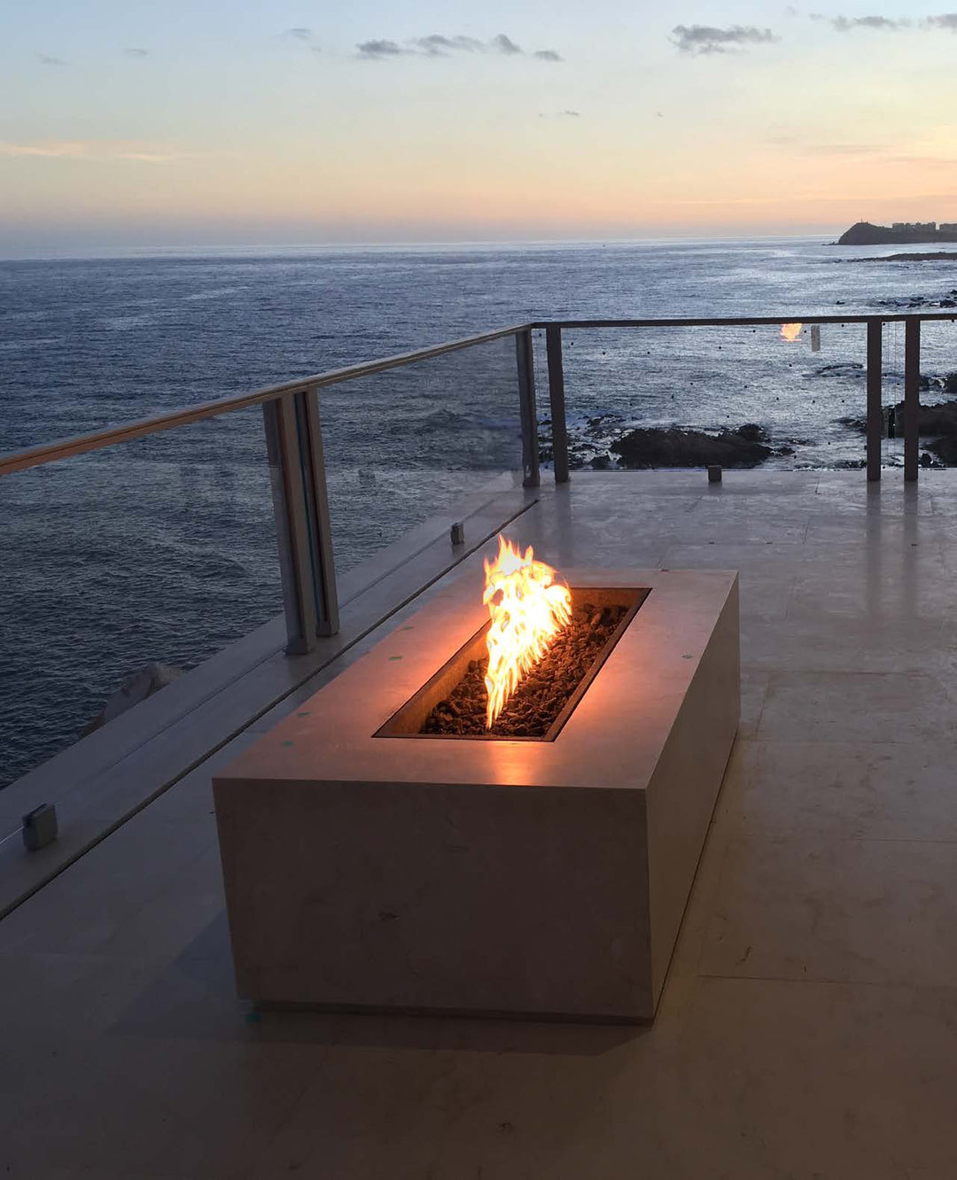The Outdoor Plus Regal Fire Pit oceanside balcony