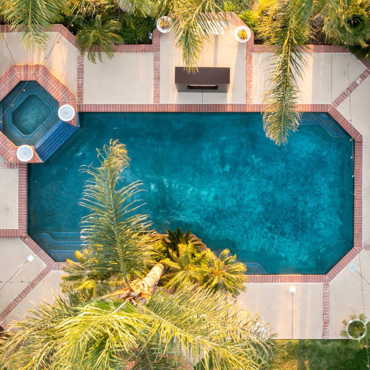 The Outdoor Plus Williams Fireplace pool view high up