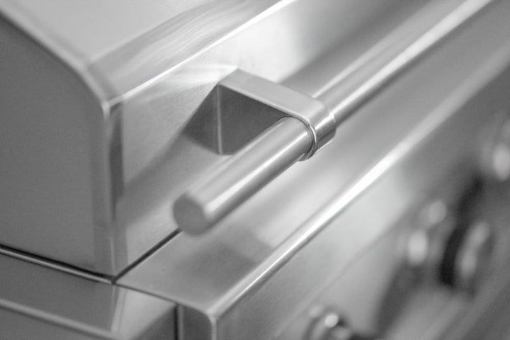 A close up of Videl Grills Cool Grip handle.